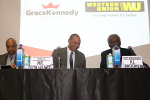 (l-r) General Manager, Caribbean, Western Union, Sean Mason, GraceKennedy Group CEO, Don Wehby and Former Prime Minister of Jamaica, Most Honourable PJ Patterson at the head table at the GraceKennedy Money Services/Western Union Town Hall Forum in Brooklyn, New York on Monday, May 4.