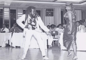Journalist Vinette K. Pryce cuts the rug with the legendary calypsonian Rootsman
