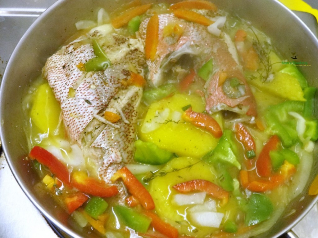 steaming snapper with veg and yellow yam