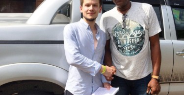Dylan Legrand shakes hands with Usain Bolts father