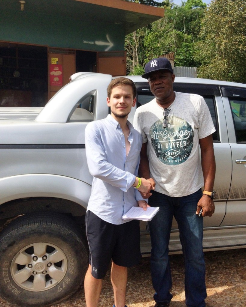Dylan Legrand shakes hands with Usain Bolts father