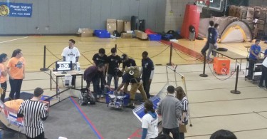 Jamaica College Robotic Team Setting up for a match
