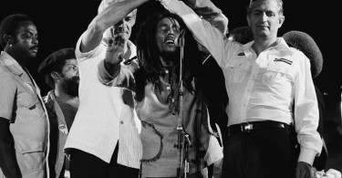Bob Marley joins the hands of political rivals, Michael Manley and Edward Seaga