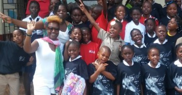 Daun Ferguson with children at Bethany Primary School Jamaica