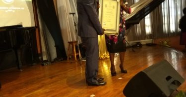 ANTHEA McGIBBON PHOTOS: Musgrave Medals Awards Ceremony held at the Lecture Hall, Institute of Jamaica on May 25th, 2017. Mr Frederick 'Freddie' McGregor collects his award from Hon Minister Olivia 'Babsy' Grange.