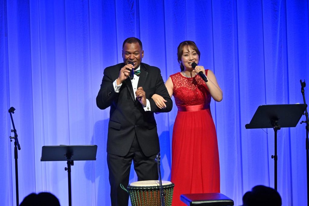 Jamaican Tenor, Steve Higgins and Japanese Soprano Yukari Kiyono. Together they sang "Fi MI Love Have Lion Heart", "Banyan Tree", "Time to Say Goodbye" and "All I Ask Of You" from Phantom Of the Opera.