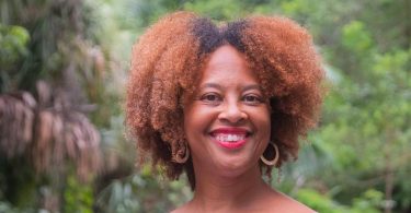 A Jamaican-American Teacher uses art and storytelling to restore hope to former blighted Redline Communities - Nerissa Street