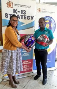 "Bike Taxi Riding" Jamaican Principal Recognized for Innovative Solution to Education Amidst COVID-19
