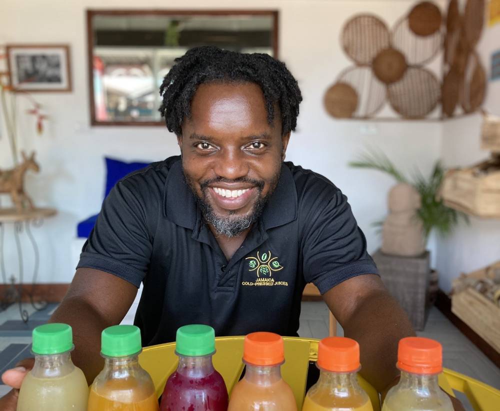 https://jamaicans.com/wp-content/uploads/British-Jamaican-Revolutionizing-the-Juice-Industry-Toussaint-Davy.jpeg