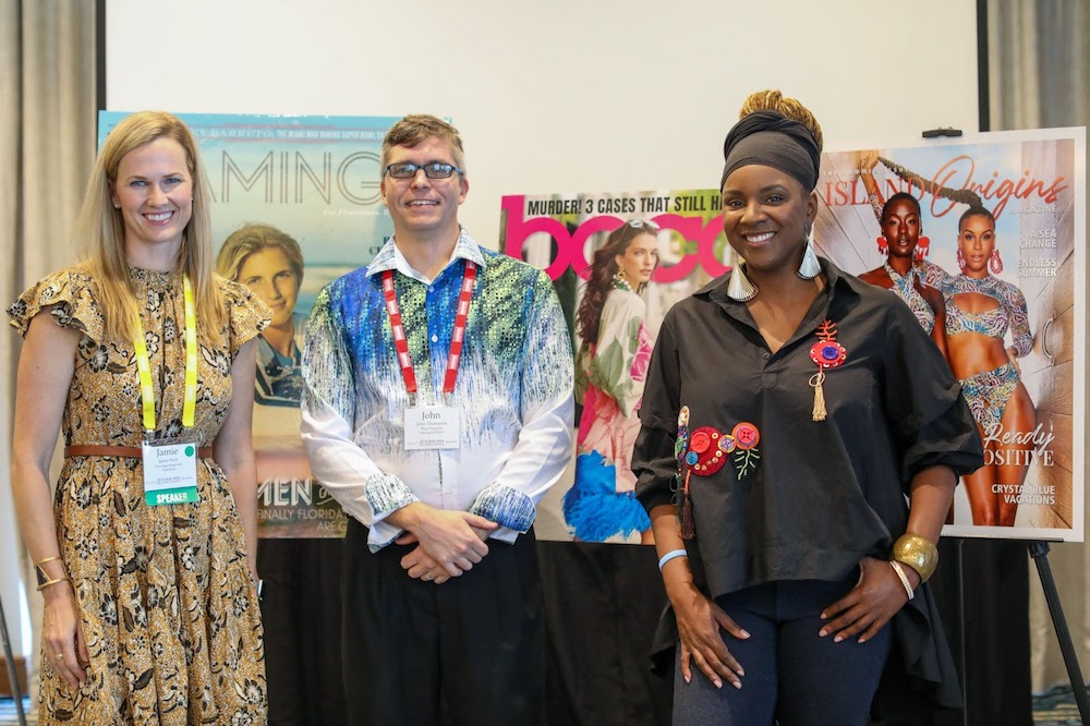 Island Origins publisher Calibe Thompson (right) stands with Flamingo Magazine publisher Jamie Rich (left) and JES managing editor John Thomason (center) following their panel. Photo credit: David I. Muir (Island Syndicate)