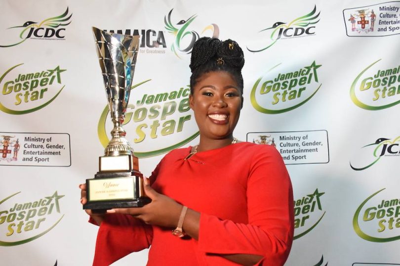 Danielle Mayne holding trophy for Jamaica Gospel Star 2022