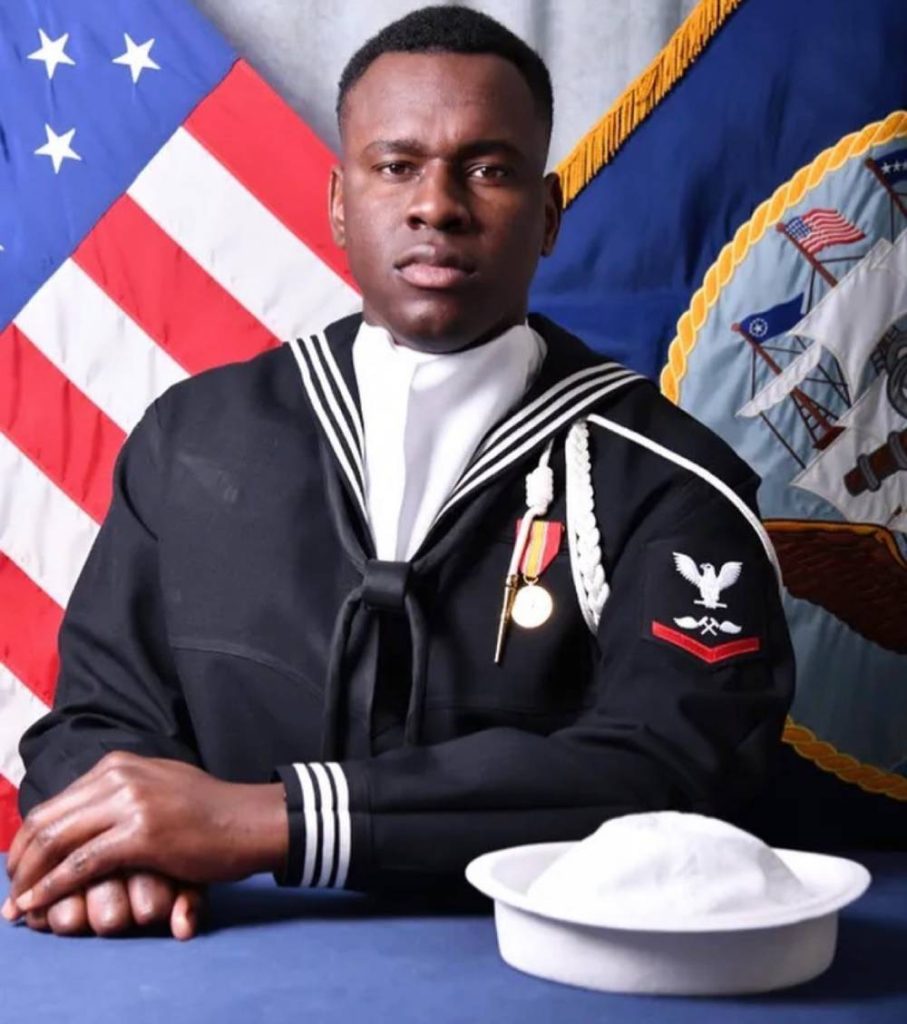Jamaican-Born Navy Sailor Based in Florida to Be Super Bowl Flag Bearer Shyeed Crooks full size
