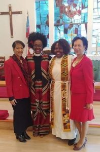Jamaican Born Reverend Audrey Bailey with parishioners 