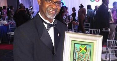 Jamaican Irwine Clare Receives AMCHAM Award