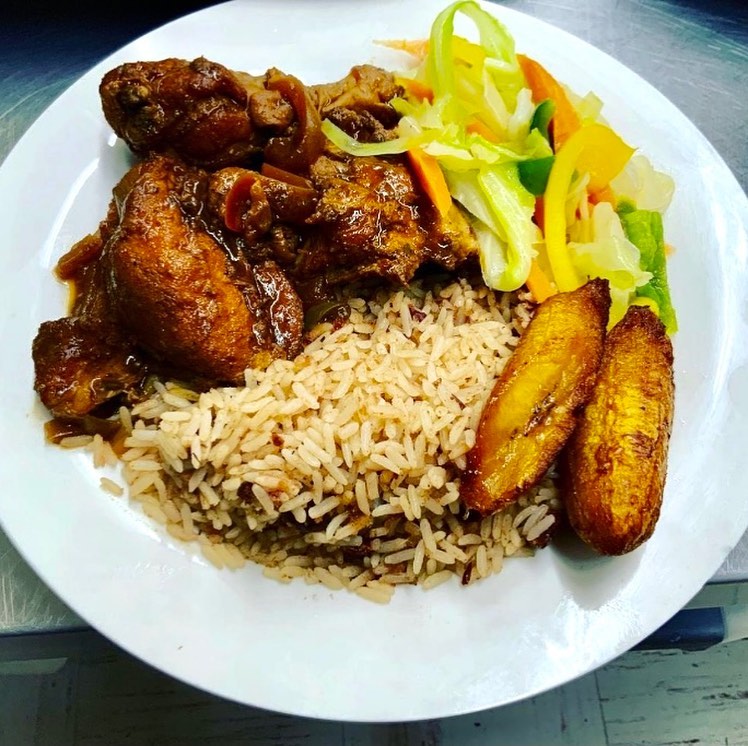 Jamaican Restaurant on List of Essential Eateries to Try In Orlando - Caribbean Sunshine Bakery - Jamaican brown chicken