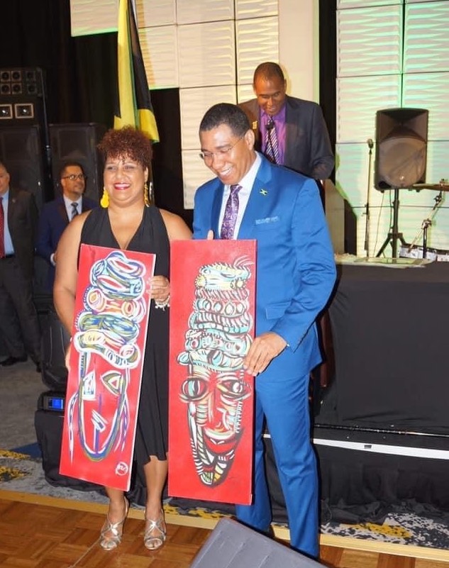Prime Minister Andrew Holness and Tammy Gammon Jamaican Artist and Designer