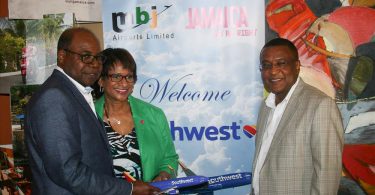 Hon. Edmund Bartlett, Jamaica’s Minister of Tourism, Ellen Torbert, Southwest’s Vice President, Diversity and Inclusion and Paul Pennicook, Director of Tourism