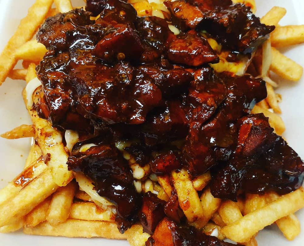 Spicy jerk chicken Poutine